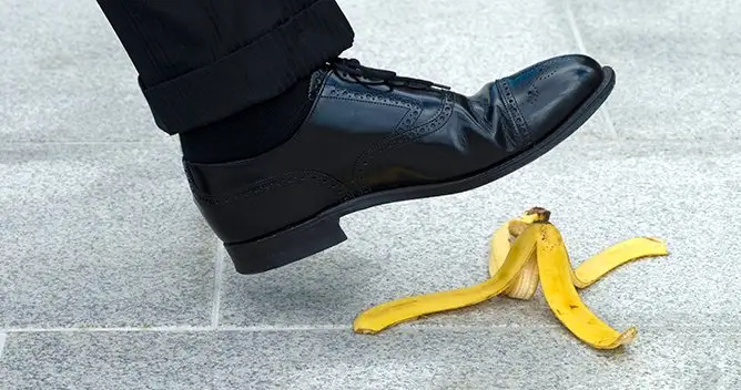 Man about to slip on a banana peel