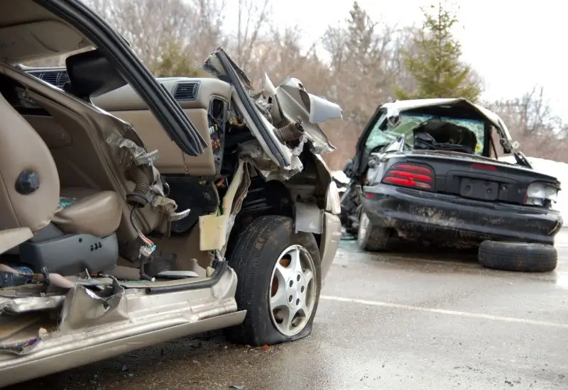 Remaining debris of two totaled cars